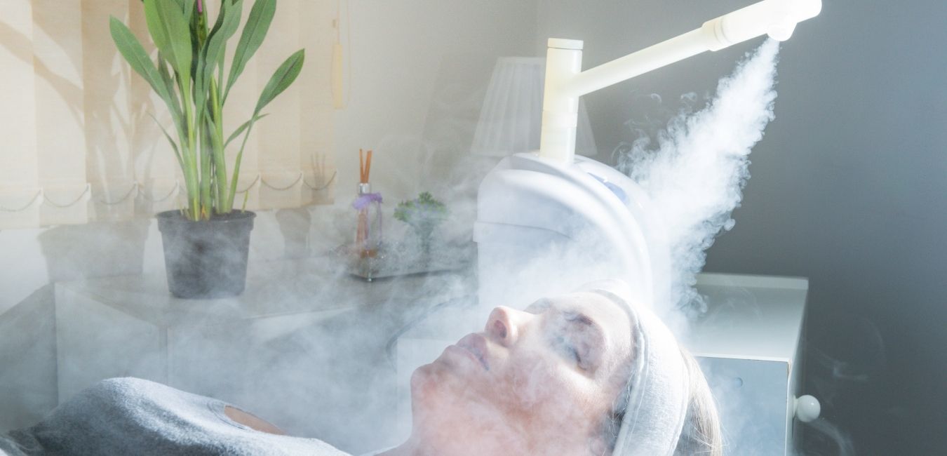 Beauty treatment of face with ozone facial steamer in a portland biological and holistic dental office