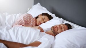 couple sleeping well after fixing their sleep apnea